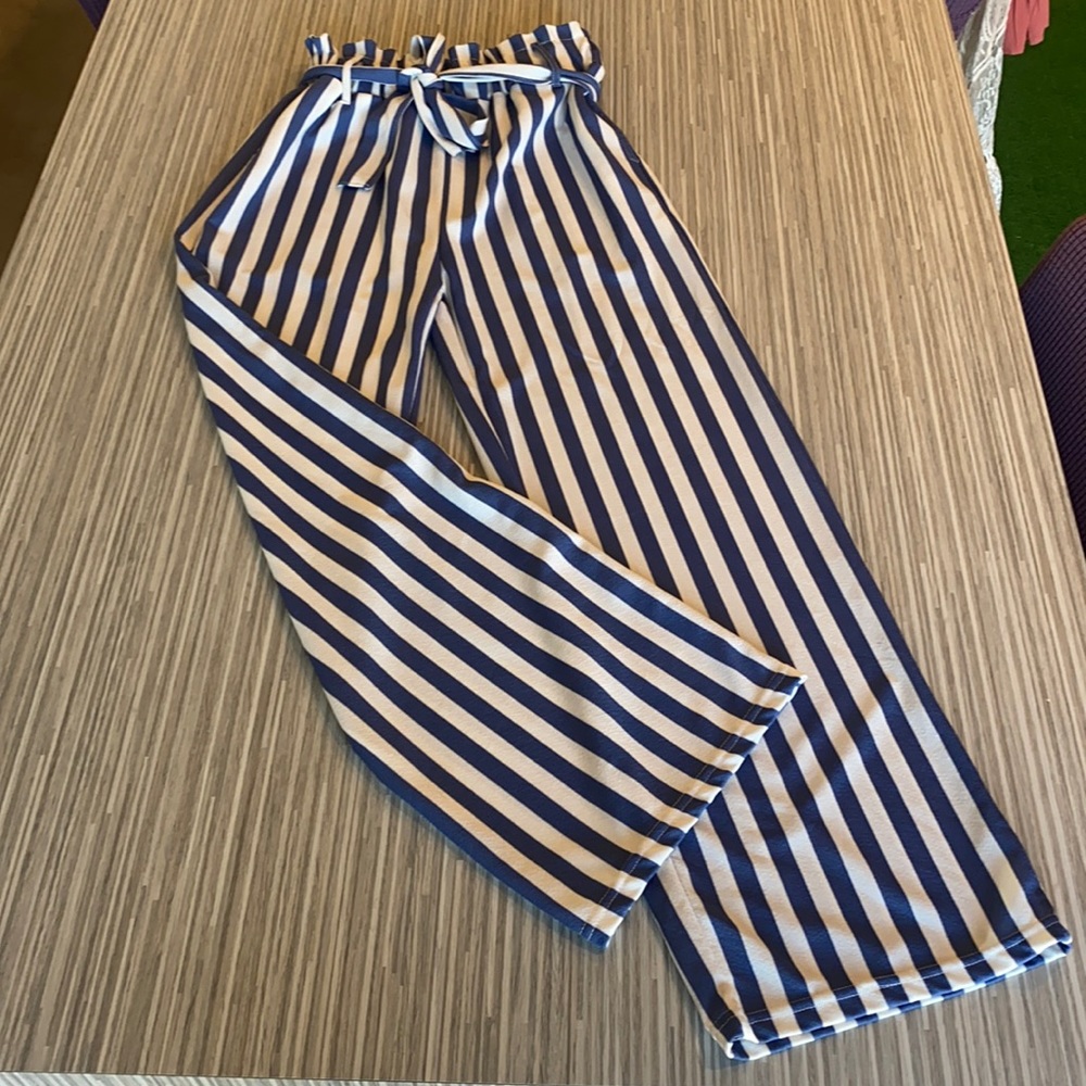 Women’s white and blue striped pants.